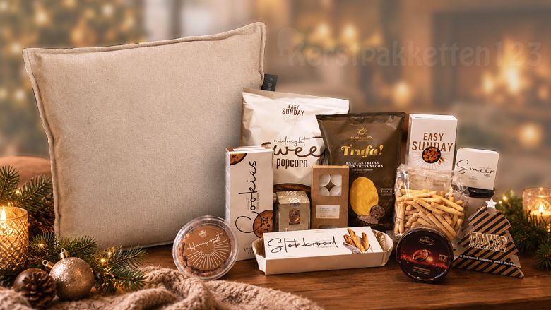 Cozy kerstpakket met warmtekussen en luxe snacks voor personeel